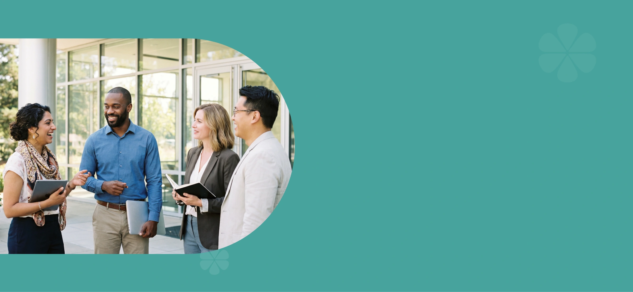 Diverse professionals collaborating outside a modern office building